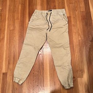 American eagle men’s extreme flex, joggers size small, tan color